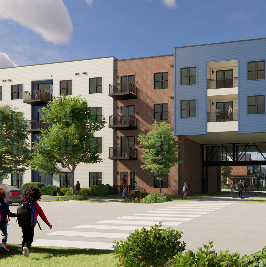A modern apartment building with brick and blue paneling features a skybridge over a pedestrian crossing, where residents and children walk through a tree-lined area.